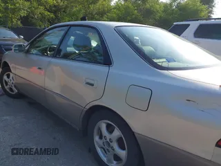 1997 Lexus ES 300 z VIN JT8BF22G7V0016733, wystawiony jako IAAI lot #42429677 z przebiegiem 204 315 mil mil oraz . Historia ofert i sprzedaży dostępna na DreamBid. Obrazek 6.