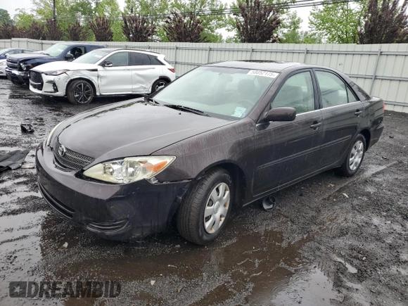 2002 Toyota Camry LE z VIN 4T1BE32K72U510377, wystawiony jako Copart lot #58052175 z przebiegiem 123 339 mil mil oraz Szkoda całkowita • Salvage title. Historia ofert i sprzedaży dostępna na DreamBid. Obrazek 1.