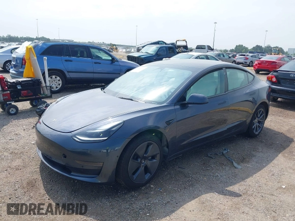 2023 Tesla Model 3 z VIN 5YJ3E1EAXPF414646, wystawiony jako IAAI lot #39514743 z przebiegiem 10 529 mil mil oraz . Historia ofert i sprzedaży dostępna na DreamBid. Obrazek 19.