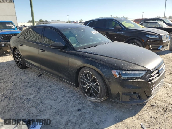 2020 Audi A8 L with VIN WAU8EAF84LN014527, listed as a Copart auction lot 84601094 with 34,620 mi miles and Salvage Title. Bid and sale history available at carsss.com. Image 4.