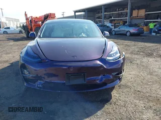 2020 Tesla Model 3 Standard Range Plus z VIN 5YJ3E1EA9LF599332, wystawiony jako IAAI lot #41563213 z przebiegiem Nie podano mil oraz . Historia ofert i sprzedaży dostępna na DreamBid. Obrazek 11.