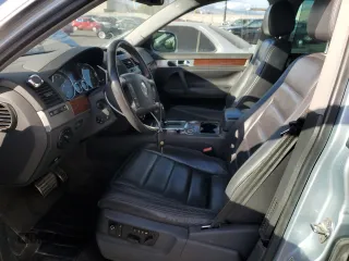 2004 Volkswagen Touareg with VIN WVGEM77LX4D071560, listed as a Copart auction lot 41630995 with 168,906 mi miles and Salvage title. Bid and sale history available at DreamBid. Image 7.