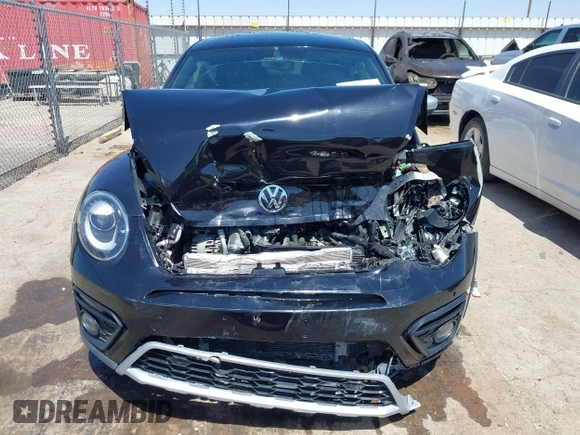 2018 Volkswagen Beetle Dune with VIN 3VWSD7AT1JM702354, listed as a IAAI auction lot 41993527 with 50,952 mi miles and . Bid and sale history available at DreamBid. Image 12.