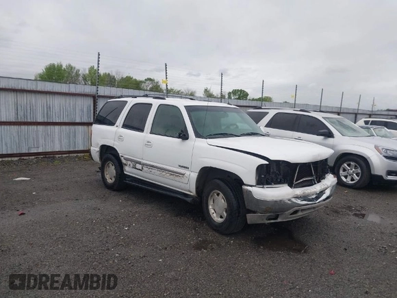 2003 GMC Yukon SLT with VIN 1GKEC13Z13J197955, listed as a IAAI auction lot 41953835 with 208,752 mi miles. Bid and sale history available at carsss.com. Image 1.
