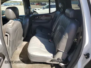2003 GMC Envoy SLT z VIN 1GKET16S736179347, wystawiony jako Copart lot #52370775 z przebiegiem 230 623 mil mil oraz Szkoda całkowita • Salvage title. Historia ofert i sprzedaży dostępna na DreamBid. Obrazek 12.