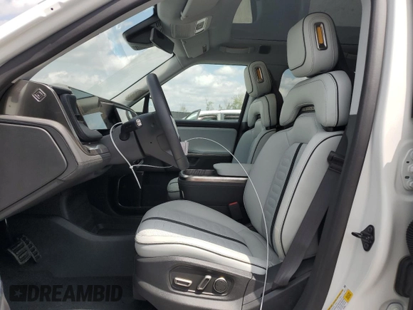 2025 Rivian R1S Adventure z VIN 7PDSGBBA5SN067374, wystawiony jako Copart lot #55279895 z przebiegiem 1 120 mil mil oraz Szkoda całkowita • Salvage title. Historia ofert i sprzedaży dostępna na DreamBid. Obrazek 7.