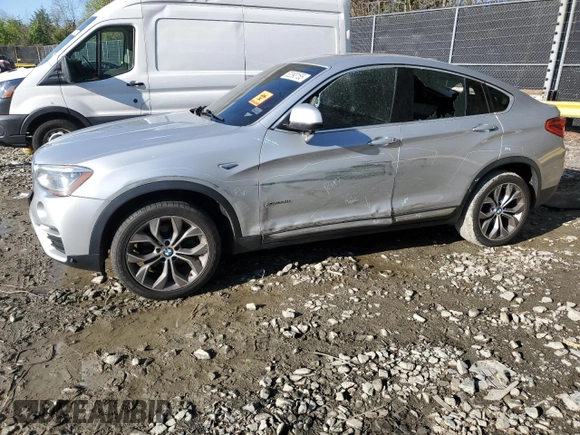 2017 BMW X4 xDrive28i with VIN 5UXXW3C52H0T77719, listed as a Copart auction lot 52393155 with 184,664 mi miles and Salvage title. Bid and sale history available at DreamBid. Image 1.