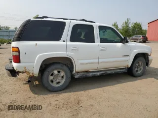 2002 Chevrolet Tahoe LT z VIN 1GNEK13Z32J217370, wystawiony jako Copart lot #59101035 z przebiegiem 225 247 mil mil oraz Czysty tytuł • Clean title. Historia ofert i sprzedaży dostępna na DreamBid. Obrazek 3.