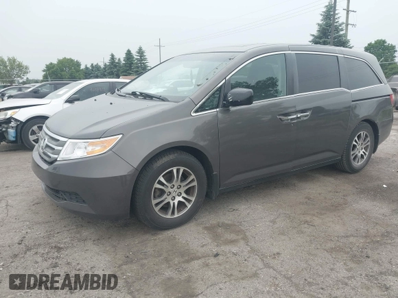 2011 Honda Odyssey EX-L with VIN 5FNRL5H64BB029087, listed as a IAAI auction lot 42508764 with 214,705 mi miles and . Bid and sale history available at DreamBid. Image 17.