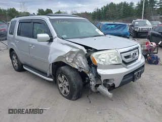 2011 Honda Pilot Touring with VIN 5FNYF4H90BB022354, listed as a IAAI auction lot 41965082 with 126,505 mi miles. Bid and sale history available at carsss.com. Image 1.