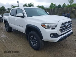 2017 Toyota Tacoma SR5 z VIN 5TFCZ5AN9HX115659, wystawiony jako IAAI lot #42375002 z przebiegiem 105 170 mil mil oraz . Historia ofert i sprzedaży dostępna na DreamBid. Obrazek 1.