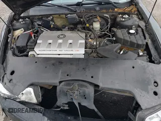 2002 Cadillac Seville Touring STS z VIN 1G6KY54982U239673, wystawiony jako IAAI lot #41657709 z przebiegiem 92 224 mil mil oraz . Historia ofert i sprzedaży dostępna na DreamBid. Obrazek 10.