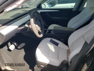 2023 Tesla Model Y Performance with VIN 7SAYGDEF3PF773031, listed as a Copart auction lot 47105765 with 25,604 mi miles and Salvage Title. Bid and sale history available at DreamBid. Image 7.