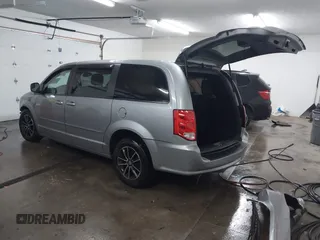 2015 Dodge Grand Caravan SE with VIN 2C4RDGBG9FR703691, listed as a IAAI auction lot 41395564 with 170,735 mi miles and . Bid and sale history available at DreamBid. Image 3.