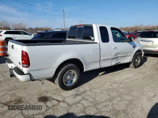 2000 Ford F-150 XL with VIN 1FTRX17L8YNB40935, listed as a Copart auction lot 86726884 with 260,636 mi miles and Salvage Title. Bid and sale history available at carsss.com. Image 3.