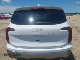 2025 Kia Telluride S with VIN 5XYP6DGC0SG590900, listed as a IAAI auction lot 42706596 with 6,712 mi miles and . Bid and sale history available at DreamBid. Image 16.