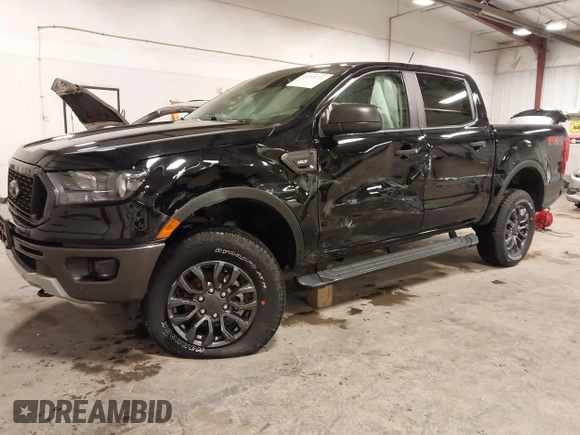 2023 Ford Ranger XL with VIN 1FTER4FH8PLE17858, listed as a IAAI auction lot 41710721 with 5,299 mi miles and . Bid and sale history available at DreamBid. Image 2.