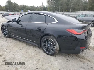 2024 BMW i4 eDrive40 with VIN WBY73AW07RFT07127, listed as a Copart auction lot 79695854 with 2,996 mi miles and Salvage Title. Bid and sale history available at carsss.com. Image 2.