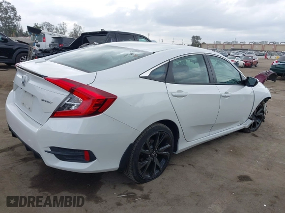 2019 Honda Civic Sport with VIN 19XFC2F82KE013269, listed as a IAAI auction lot 42118857 with 80,212 mi miles and . Bid and sale history available at DreamBid. Image 4.