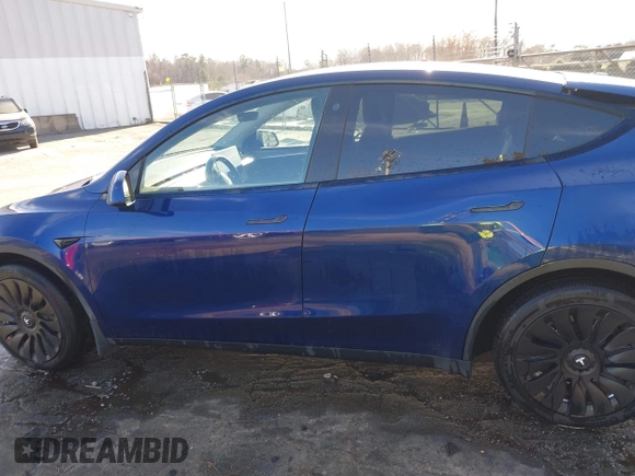 2023 Tesla Model Y Long Range with VIN 7SAYGDEE4PA042757, listed as a IAAI auction lot 41652541 with 48,569 mi miles. Bid and sale history available at carsss.com. Image 15.
