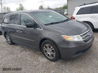 2012 Honda Odyssey EX-L with VIN 5FNRL5H65CB146792, listed as a IAAI auction lot 42088903 with 214,961 mi miles. Bid and sale history available at carsss.com. Image 1.