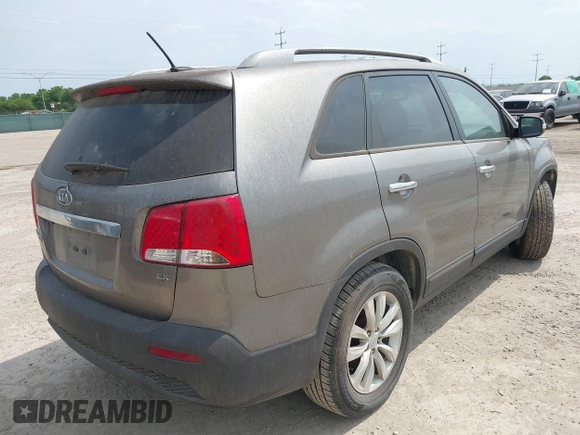 2011 Kia Sorento EX with VIN 5XYKU3A14BG100573, listed as a IAAI auction lot 42084108 with 245,187 mi miles. Bid and sale history available at carsss.com. Image 4.