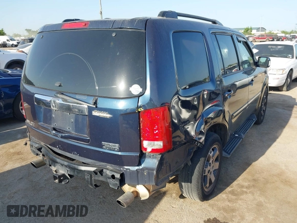 2011 Honda Pilot Touring with VIN 5FNYF4H92BB090056, listed as a IAAI auction lot 42010682 with 201,640 mi miles. Bid and sale history available at carsss.com. Image 4.