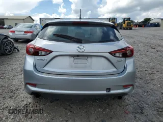 2018 Mazda 3 Touring z VIN 3MZBN1L30JM164074, wystawiony jako Copart lot #56741745 z przebiegiem 86 812 mil mil oraz Szkoda całkowita • Salvage title. Historia ofert i sprzedaży dostępna na DreamBid. Obrazek 6.