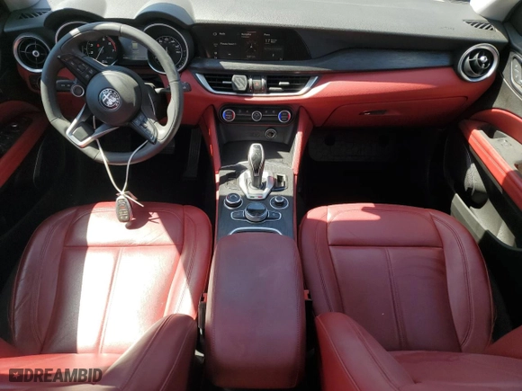 2020 Alfa Romeo Stelvio with VIN ZASPAJAN5L7C94672, listed as a Copart auction lot 49097535 with 64,009 mi miles and Salvage Title. Bid and sale history available at carsss.com. Image 8.
