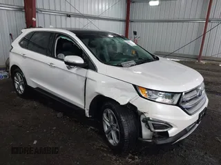 2015 Ford Edge Titanium z VIN 2FMTK4K83FBB63021, wystawiony jako IAAI lot #42045295 z przebiegiem 91 328 mil mil oraz . Historia ofert i sprzedaży dostępna na DreamBid. Obrazek 1.