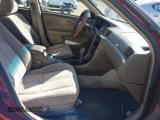 1998 Toyota Camry LE z VIN 4T1BG22K9WU367829, wystawiony jako IAAI lot #41820041 z przebiegiem 226 699 mil mil oraz . Historia ofert i sprzedaży dostępna na DreamBid. Obrazek 5.
