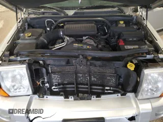 2007 Jeep Commander Sport z VIN 1J8HG48P17C547173, wystawiony jako Copart lot #58840465 z przebiegiem 169 135 mil mil oraz Nie do naprawy • Non repairable. Historia ofert i sprzedaży dostępna na DreamBid. Obrazek 12.