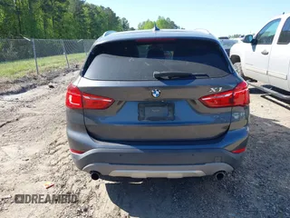 2017 BMW X1 xDrive28i with VIN WBXHT3C31H5F80056, listed as a IAAI auction lot 42049925 with 64,471 mi miles and . Bid and sale history available at DreamBid. Image 16.