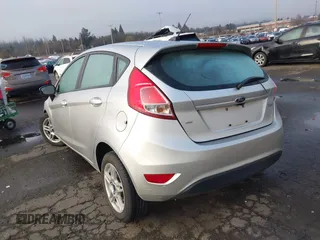 2019 Ford Fiesta SE z VIN 3FADP4EJ7KM147864, wystawiony jako IAAI lot #41692160 z przebiegiem 87 417 mil mil oraz . Historia ofert i sprzedaży dostępna na DreamBid. Obrazek 3.