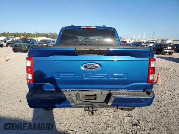 2023 Ford F-150 XL with VIN 1FTFW1E51PKF30933, listed as a Copart auction lot 76121834 with 26,267 mi miles and Salvage Title. Bid and sale history available at carsss.com. Image 6.