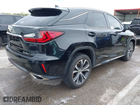 2017 Lexus RX 350 with VIN 2T2ZZMCA1HC058267, listed as a IAAI auction lot 41974749 with 85,416 mi miles and . Bid and sale history available at DreamBid. Image 4.