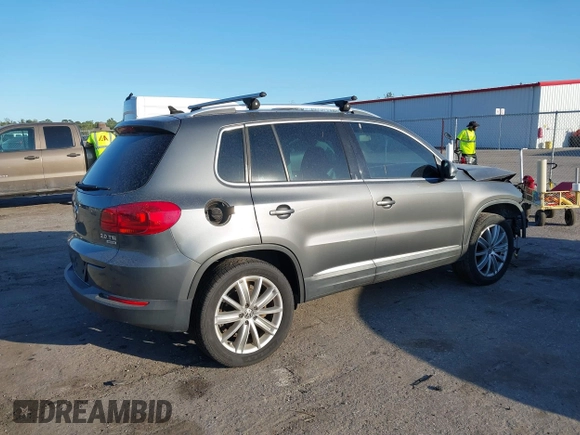 2013 Volkswagen Tiguan SE z VIN WVGBV7AX1DW006760, wystawiony jako IAAI lot #41563994 z przebiegiem 167 044 mil mil oraz . Historia ofert i sprzedaży dostępna na DreamBid. Obrazek 4.