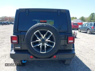 2024 Jeep Wrangler Sport S with VIN 1C4RJXN68RW161359, listed as a IAAI auction lot 41995243 with 19,640 mi miles and . Bid and sale history available at DreamBid. Image 16.