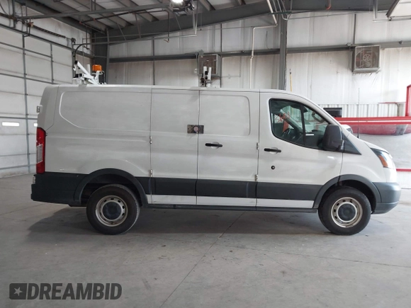 2015 Ford Transit Cargo with VIN 1FTNR1ZM2FKA55134, listed as a IAAI auction lot 42193601 with 96,231 mi miles and . Bid and sale history available at DreamBid. Image 13.
