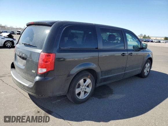 2014 Dodge Grand Caravan SE with VIN 2C4RDGBG2ER341797, listed as a Copart auction lot 49439405 with 102,633 mi miles and Salvage Title. Bid and sale history available at DreamBid. Image 3.