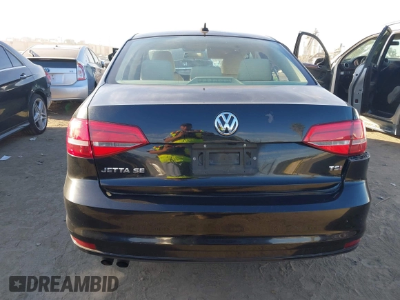2015 Volkswagen Jetta Sedan 1.8T SE with VIN 3VWD17AJ3FM407697, listed as a IAAI auction lot 40659086 with 107,834 mi miles. Bid and sale history available at carsss.com. Image 16.