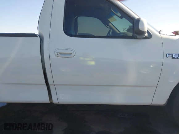 2003 Ford F-150 XL with VIN 1FTRF17293NA46808, listed as a IAAI auction lot 41156923 with 384,475 mi miles and . Bid and sale history available at DreamBid. Image 13.