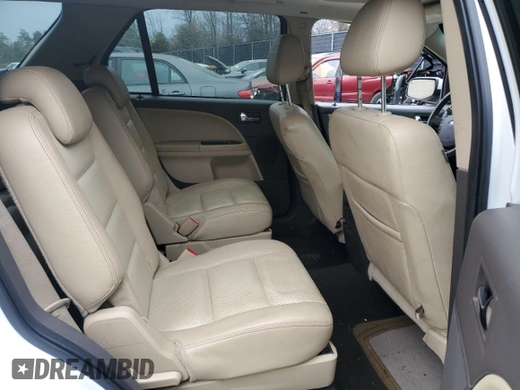 2008 Ford Taurus X Eddie Bauer z VIN 1FMDK07W18GA20603, wystawiony jako Copart lot #46578745 z przebiegiem Nie podano mil oraz Szkoda całkowita • Salvage title. Historia ofert i sprzedaży dostępna na DreamBid. Obrazek 11.