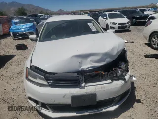 2014 Volkswagen Jetta SE with VIN 3VWD17AJ6EM265926, listed as a Copart auction lot 59060335 with 113,994 mi miles and Salvage title. Bid and sale history available at DreamBid. Image 5.