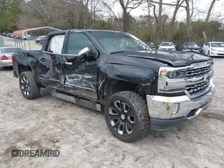 2017 Chevrolet Silverado 1500 LTZ with VIN 3GCUKSEC2HG464800, listed as a IAAI auction lot 41516254 with 220,000 mi miles and . Bid and sale history available at DreamBid. Image 1.