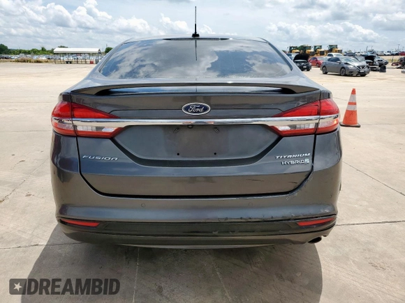 2017 Ford Fusion Hybrid Titanium with VIN 3FA6P0RU1HR368930, listed as a Copart auction lot 64965075 with 180,607 mi miles and Clean title. Bid and sale history available at DreamBid. Image 6.