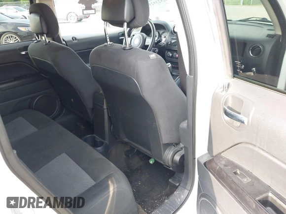 2015 Jeep Patriot Sport with VIN 1C4NJRBB0FD279697, listed as a IAAI auction lot 42523925 with 103,192 mi miles and . Bid and sale history available at DreamBid. Image 8.