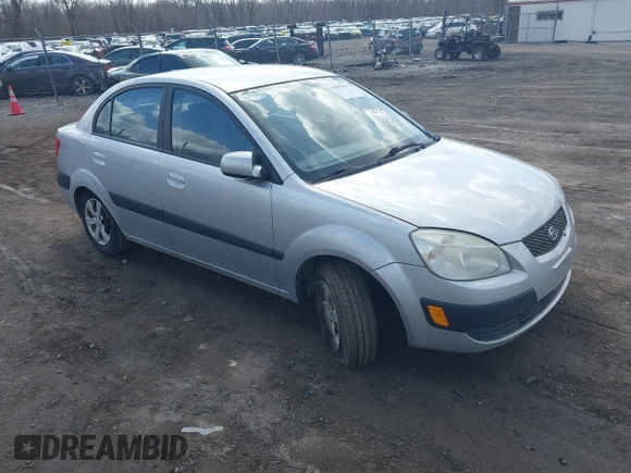 2009 Kia Rio LX with VIN KNADE223796521410, listed as a IAAI auction lot 41887883 with 82,360 mi miles and . Bid and sale history available at DreamBid. Image 1.