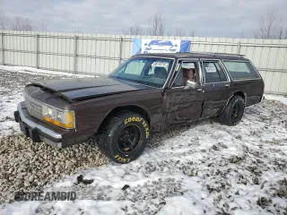 1989 Ford Crown Victoria z VIN 2FABP77F8KX129671, wystawiony jako Copart lot #86410274 z przebiegiem 58 851 mil mil oraz Szkody całkowita. Historia ofert i sprzedaży dostępna na DreamBid. Obrazek 1.