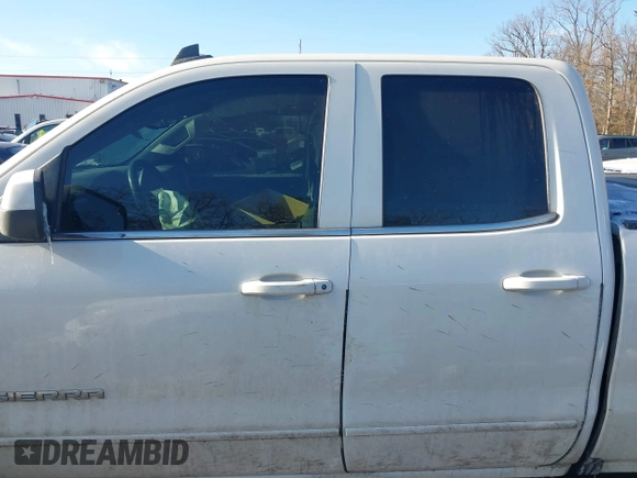 2019 GMC Sierra 1500 SLE z VIN 2GTV2MEC8K1237210, wystawiony jako IAAI lot #41354434 z przebiegiem 164 999 mil mil oraz . Historia ofert i sprzedaży dostępna na DreamBid. Obrazek 14.
